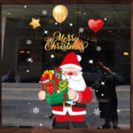 Decal Noel Ông Già Noel Cầm Quà – Merry Christmas | Hít Tĩnh Điện | Khổ 45×60cm – MingDecor